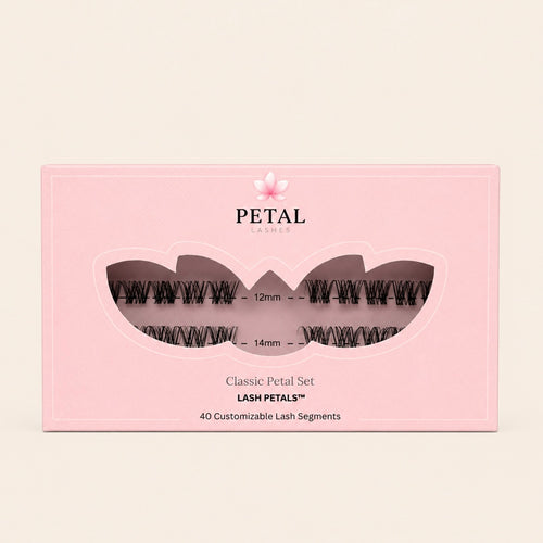 Pink packaging of Petal Lashes with clear window showing lash segments on a beige background
